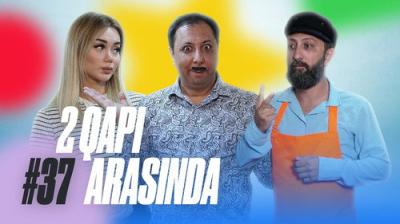 2 Qapı Arasında