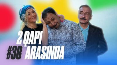 2 Qapı Arasında