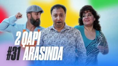 2 Qapı Arasında
