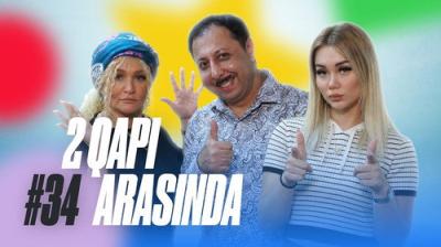 2 Qapı Arasında