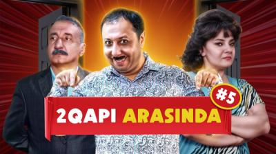 2 Qapı Arasında