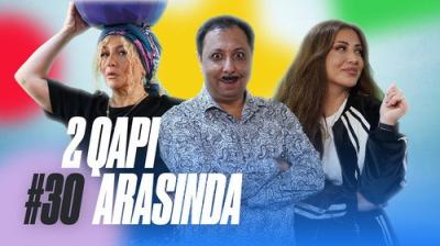 2 Qapı Arasında